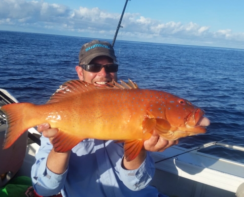 Tackle World's Local Hero Mick Lawrance with his first Coral Trout