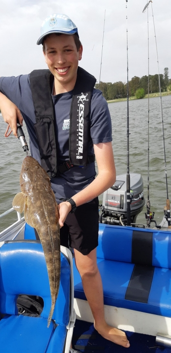 Caught a 70cm flathead on run out tide using an America made soft plastic on a 1-3 kg rod, 2500 abu Garcia real matched with 8 lb line